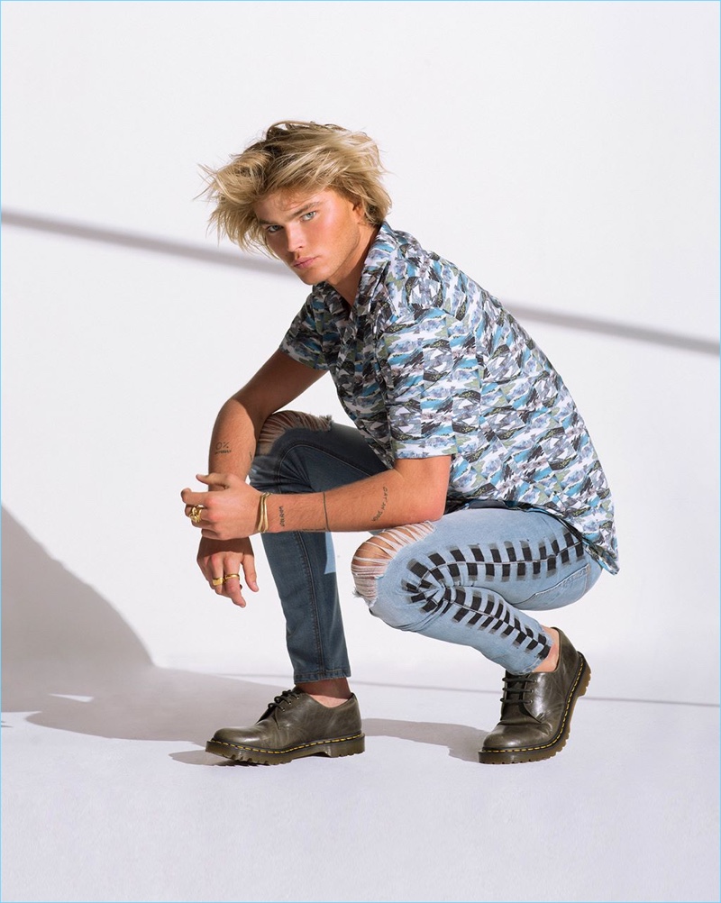 Jordan Barrett rocks printed denim jeans from Penshoppe's Denimlab collection.