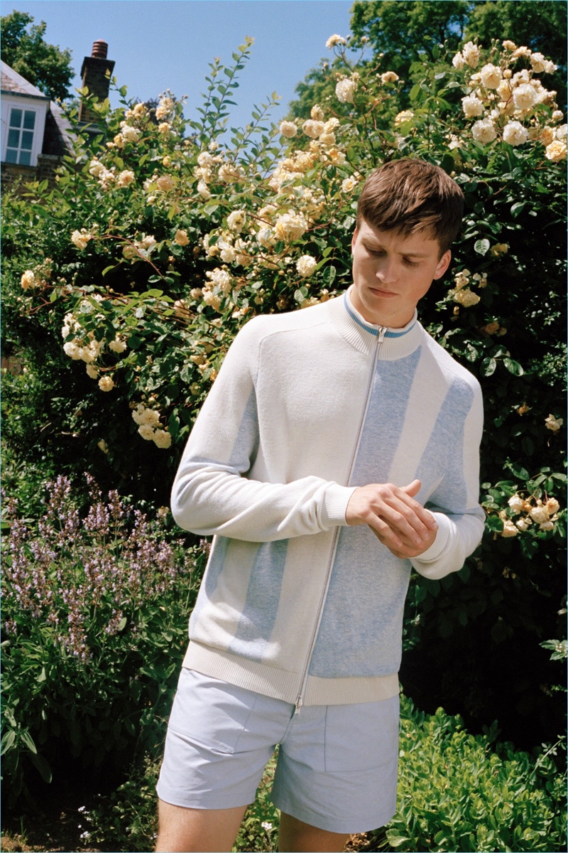 Embracing a pale blue tone, Hamish Frew wears a look from Pringle of Scotland's spring-summer 2019 collection.