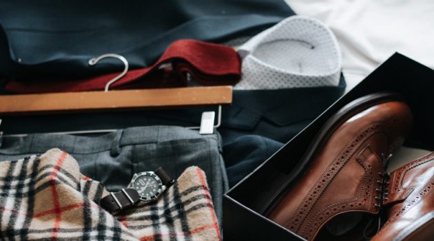 5 Habits You Should Adopt to Become a Successful & Organized Man Menswear Suit on Bed