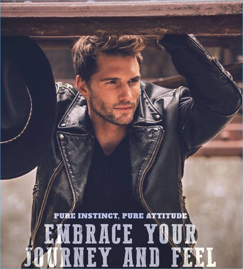 Sporting a leather bike jacket, Tomas Skoloudik stars in Avon's Wild Country fragrance campaign.
