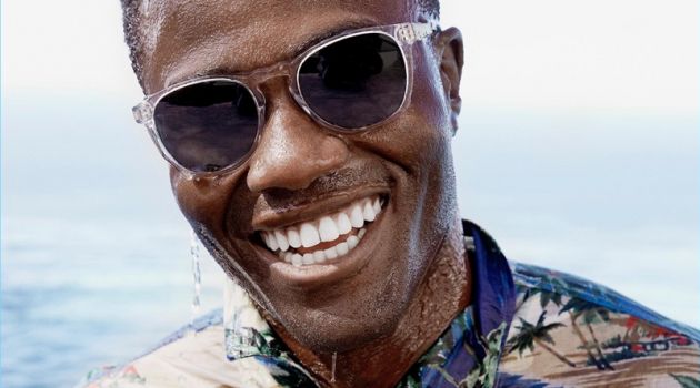 All smiles, Remi Alade-Chester wears Warby Parker's Topper Wide sungla...