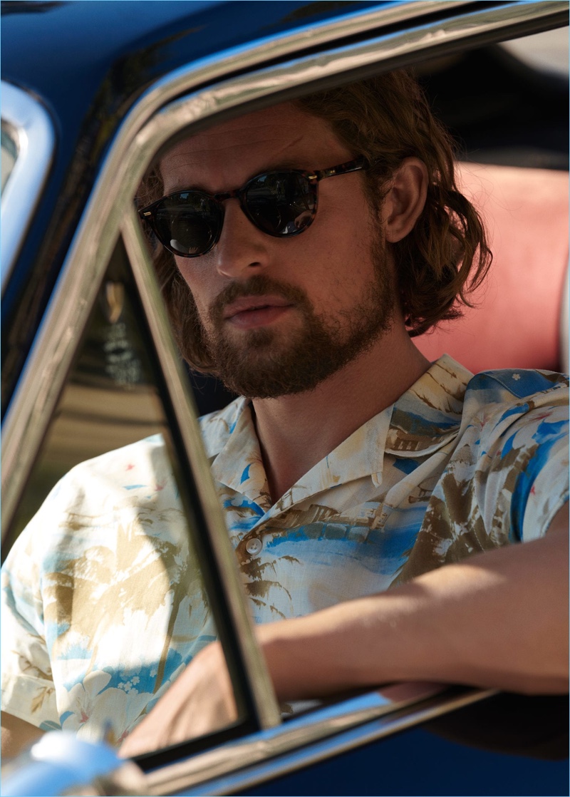 Getting behind the wheel, Wouter Peelen wears a Hawaiian shirt from Mango Man.