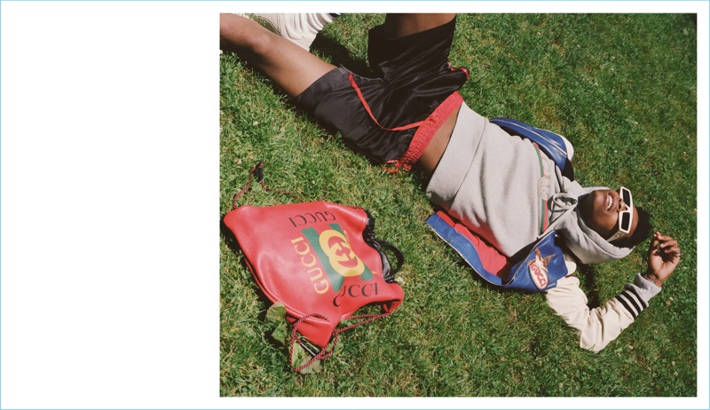 Taking in the summer sun, Morocco sports a look from Gucci.