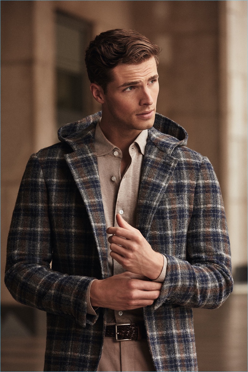 British model Edward Wilding sports a check Belvest coat.