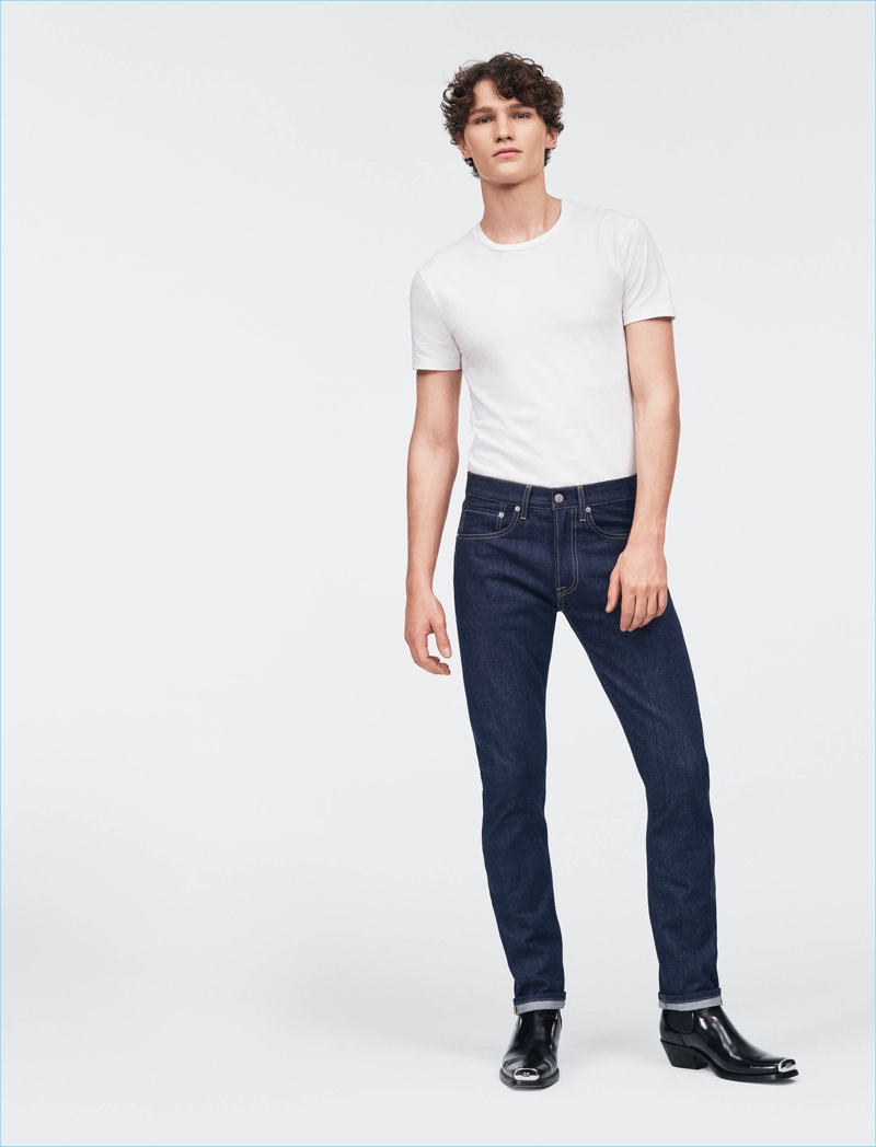 Athletic Taper CKJ 056 Jeans: Sits at waist with relaxed fit through seat and thigh. Calvin Klein Jeans' style features a tapered leg as well.