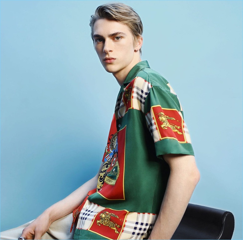 Starring in a style shoot for Matches Fashion, Dominik Sadoch wears a printed silk shirt and trousers by Burberry.