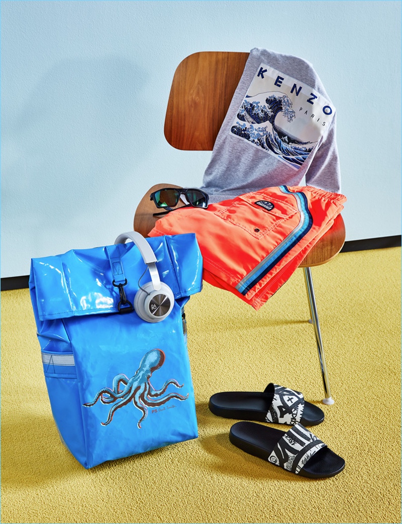 For the Thrill Seeker: Kenzo Wave t-shirt, Bang & Olufsen H4 headphones, Bally sandals, Sundek board shorts, Paul Smith roll top octopus backpack, and Oakley sunglasses.