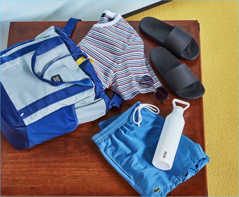 For the Tech Fiend: Le Specs sunglasses, Theory striped t-shirt, MiiR vacuum insulated bottle, Vince slide sandals, Lacoste swim shorts, and Herschel Supply Co. tote bag.