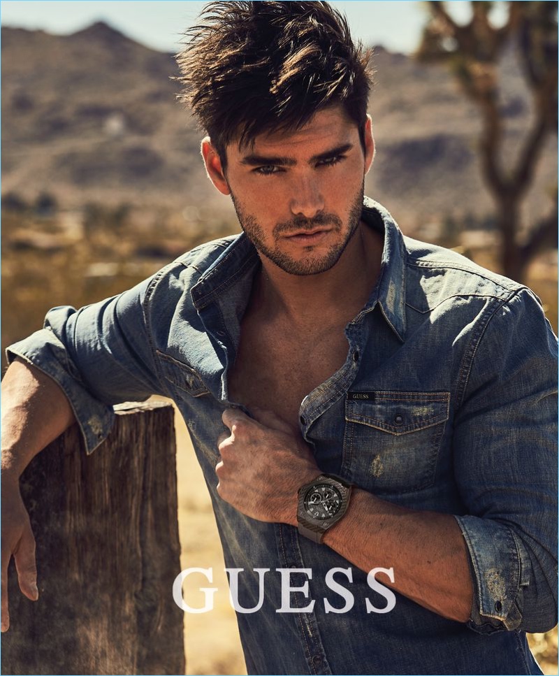 Donning a denim shirt, Charlie Matthews stars in Guess' fall-winter 2018 campaign.