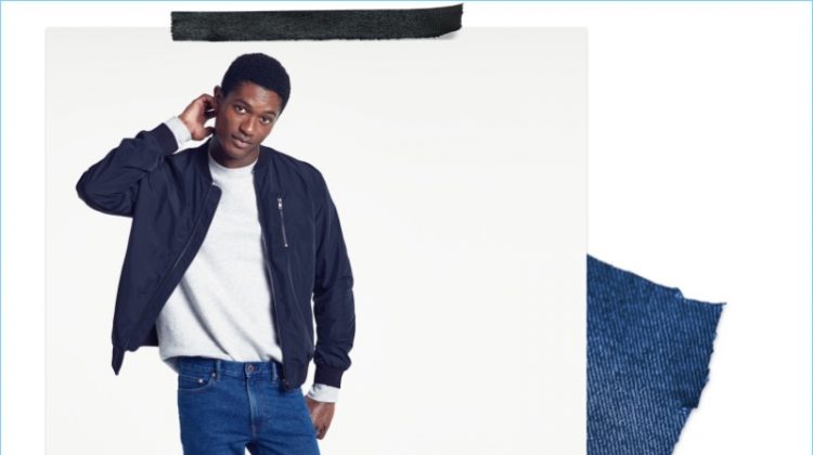 Slim Fit Jeans: Hamid Onifade sports H&M slim jeans with a pullover and bomber jacket.