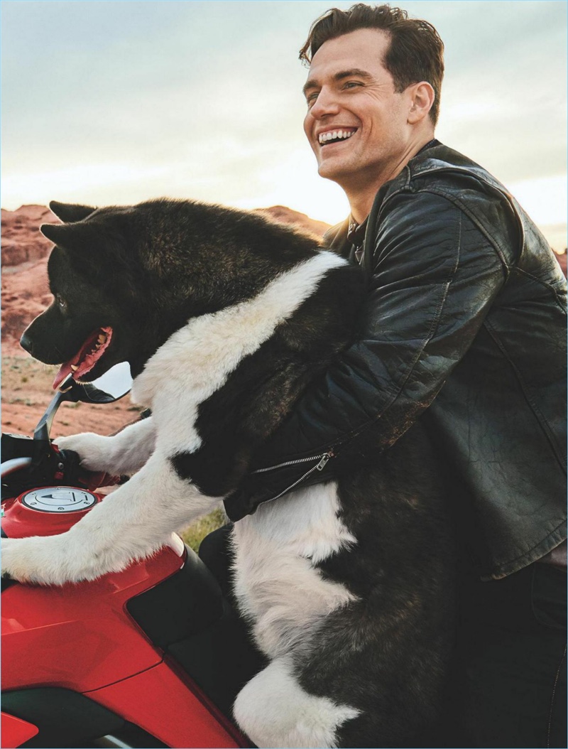 All smiles, Henry Cavill poses with his dog Kal-El.