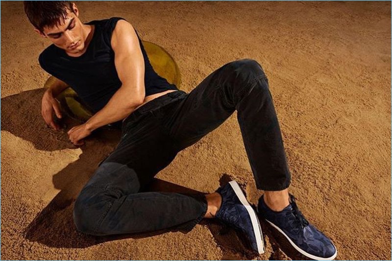 Sporting all black, Jacob Hankin connects with Steve Madden for its summer 2018 campaign.