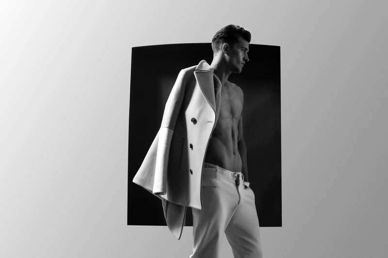 Jamie wears coat Ports 1961 and trousers Roberto Cavalli.