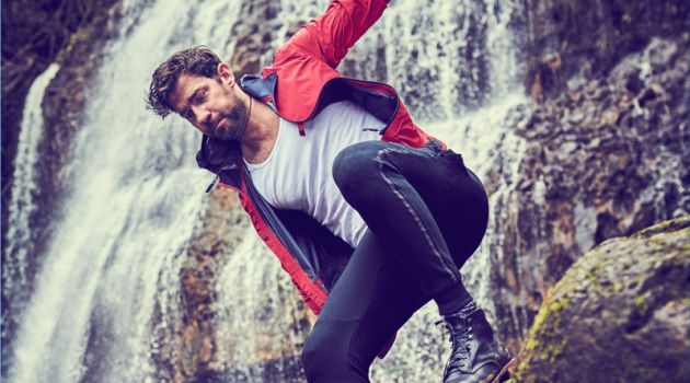 John Krasinski Covers Men's Health, Discusses Staying Fit Actor John Krasinski wears a Z Zegna windbreaker, Calvin Klein tank, New Balance joggers, American Trench socks, a Breitling watch, and David Yurman necklace.