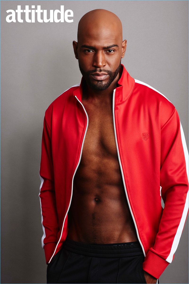 Karamo Brown wears a tracksuit jacket by The Kooples with Valentino joggers.