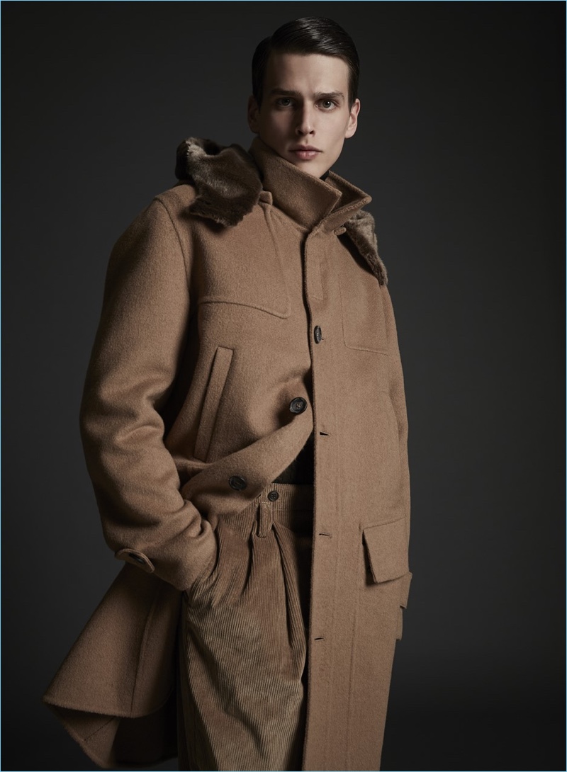 Simon Van Meervenne dons a camel coat from Major Giovanni Allegri's fall-winter 2018 collection.