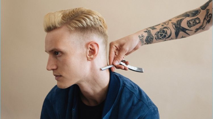 Model Alexander Johansson receives a hair update with a side part faded to skin hairstyle.