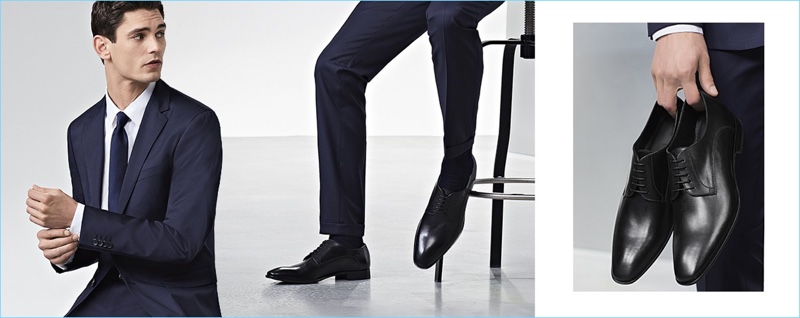 Here, Arthur wears a navy suit with black dress shoes. However, you can also wear it with complementary navy shoes or a style in cognac.