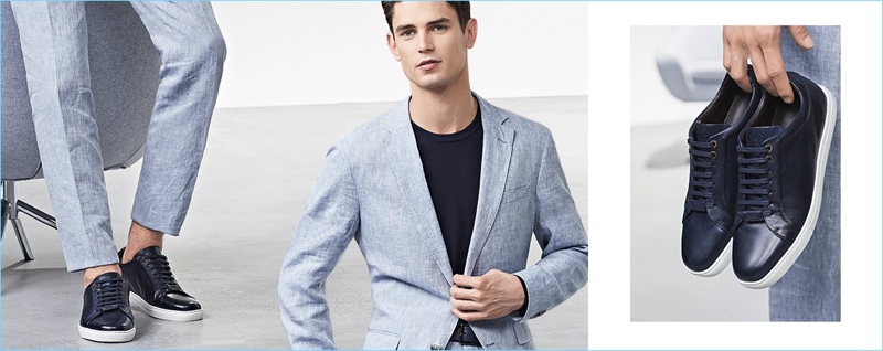 Summer Business: BOSS goes light with a pale blue suit. Wear the statement piece with black or navy shoes.