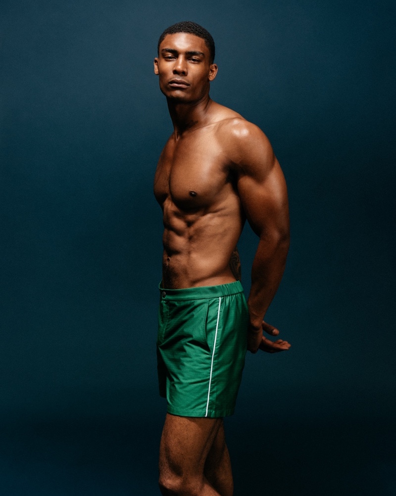 Taejahn wears newport green swim shorts T. Christopher.