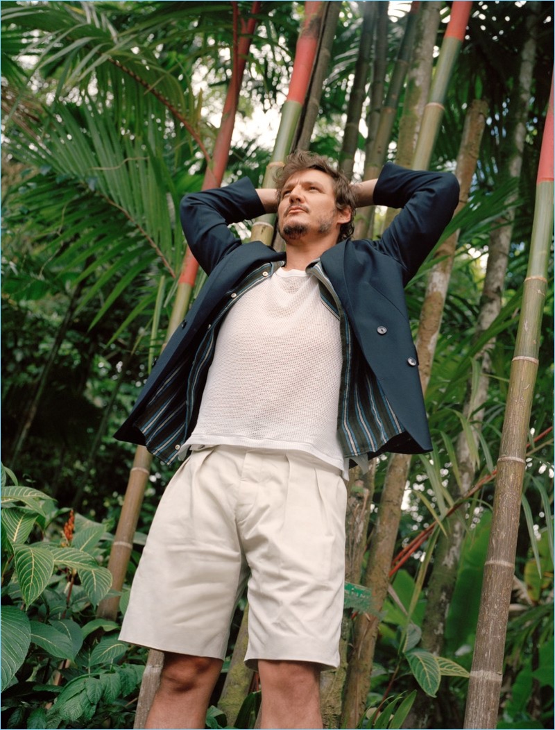 Actor Pedro Pascal sports an Urban Outfitters tank, President's jacket, HUGO blazer, and BOSS shorts.