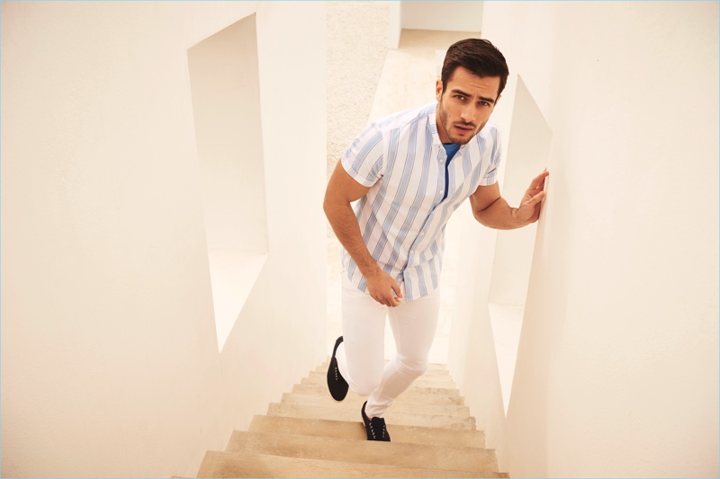 Embracing summer, Aleksandar Rusić sports a striped shirt and white jeans from River Island. » Aleksandar Rusić & David Agbodji Enjoy a Summer of Style with River Island Embracing summer, Aleksandar Rusić sports a striped shirt and white jeans from River Island.