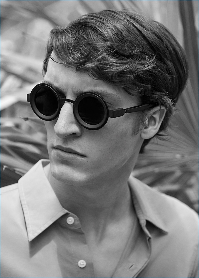 Sporting round-frame sunglasses from Kuboraum, Tim Dibble also wears an Oliver Spencer shirt.