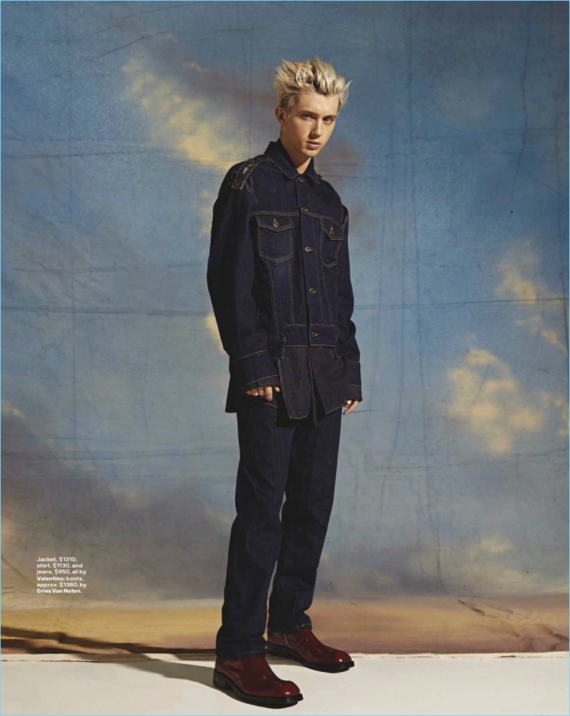 Clad in denim, Troye Sivan wears a Valentino look with Dries Van Noten boots.