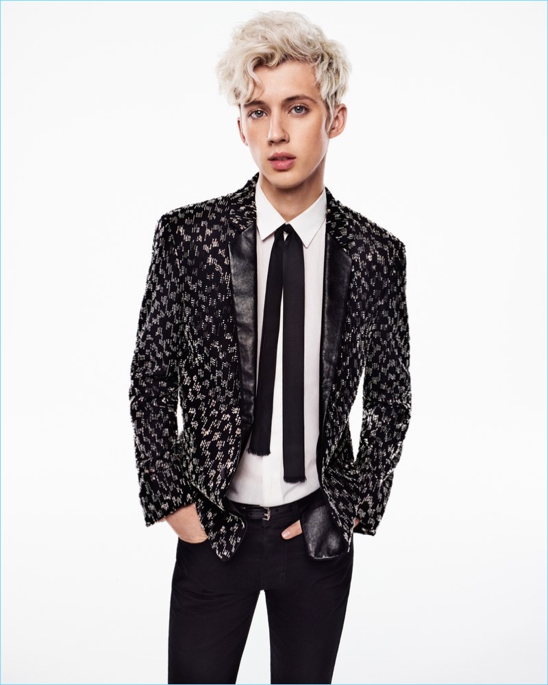 Going glam, Troye Sivan wears a sharply tailored number from Saint Laurent.