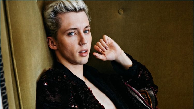 Starring in a photo shoot, Troye Sivan wears a sequined look from Saint Laurent.