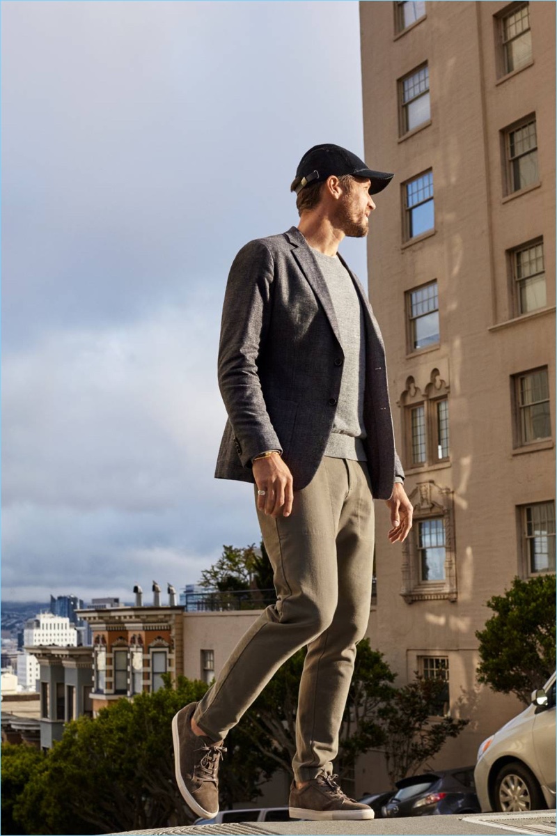 On the move, Albert Reed wears Banana Republic's Traveler Utility Pant.