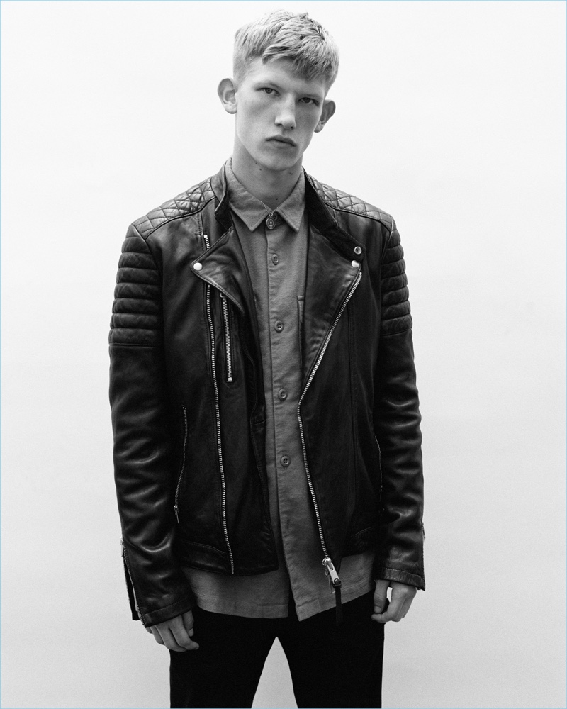 Sporting a leather biker jacket, Connor Newall appears in AllSaints' fall 2018 campaign.