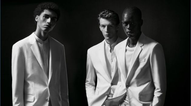 BOSS Celebrates Michael Jackson with Capsule Collection Models Sol Goss, Finnlay Davis, and Alpha Dia don white suits from the BOSS x Michael Jackson capsule collection.