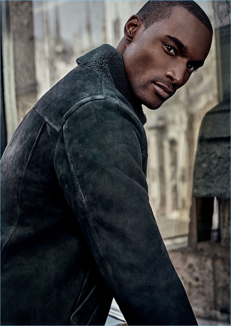 Corey Baptiste dons a suede and shearling jacket from Canali's fall-winter 2018 collection.