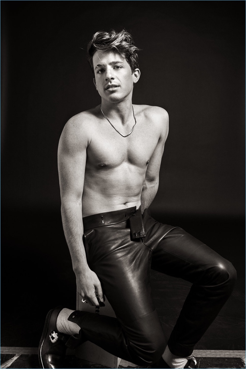 Pictured shirtless, Charlie Puth wears leather pants by Ermenegildo Zegna Couture with Ovadia & Sons shoes. 