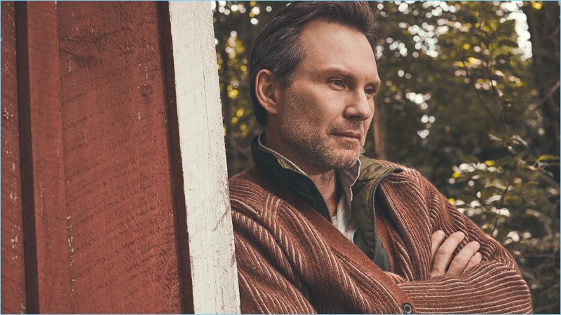 Connecting with Mr Porter, Christian Slater wears a Lanvin cardigan, Pataonia vest, Mollusk shirt, and Holiday Boileau t-shirt.