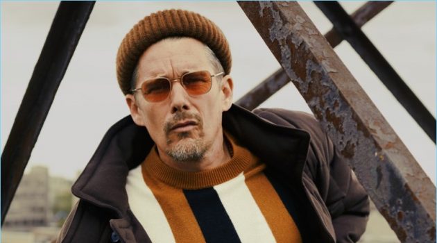 Ethan Hawke Dons Fall Fashions for GQ, Talks 'First Reformed' A cool vision, Ethan Hawke wears a BOSS coat, pants, and beanie. Hawke also rocks a Sandro sweater and Garrett Leight sunglasses.