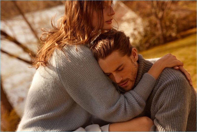 Couple Sara Blomqvist and Jeremy Young embrace for Filippa K's fall-winter 2018 campaign.