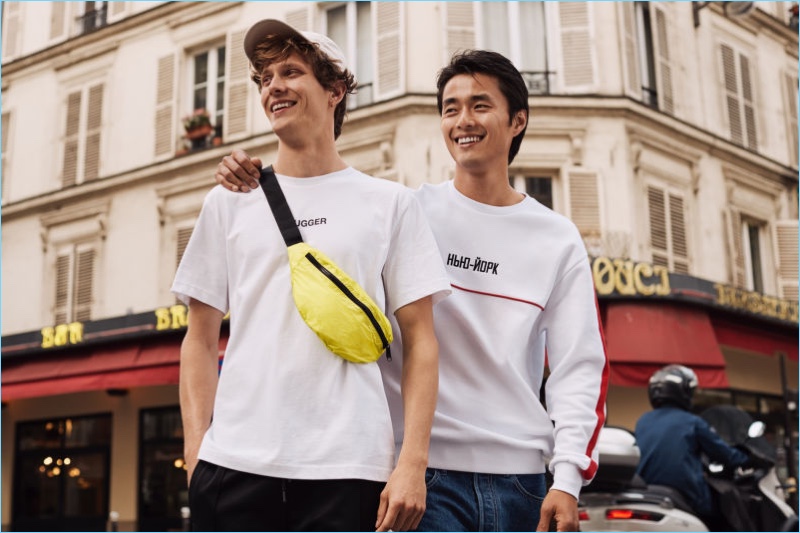 Models Felix Gesnouin and Zhao Lei sports fashions from H&M. Felix wears one of the brand's trendy belt bags.