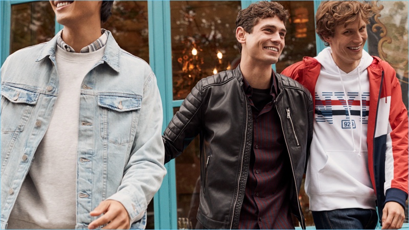 All smiles, Zhao Lei, Arthur Gosse, and Felix Gesnouin model transitional jackets from H&M Men.