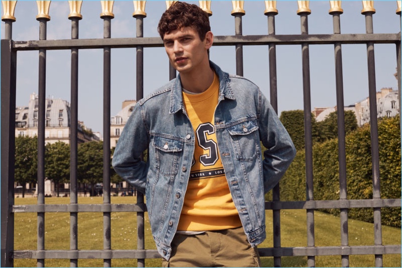 French model Arthur Gosse keeps it casual in a H&M denim jacket.