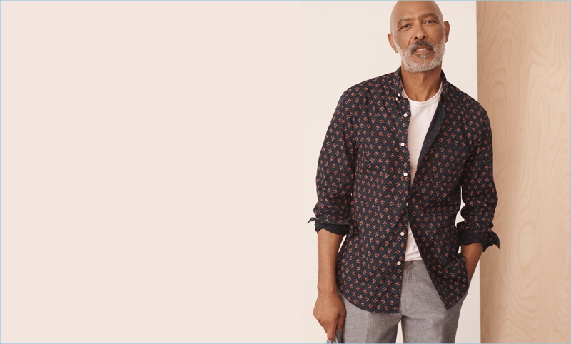 Untucked Shirts: Lono Brazil makes a case for untucked shirts in J.Crew's navy floral shirt that features a shorter hem. He also sports a garment-dyed slub cotton t-shirt and Ludlow classic-fit suit pants in linen.