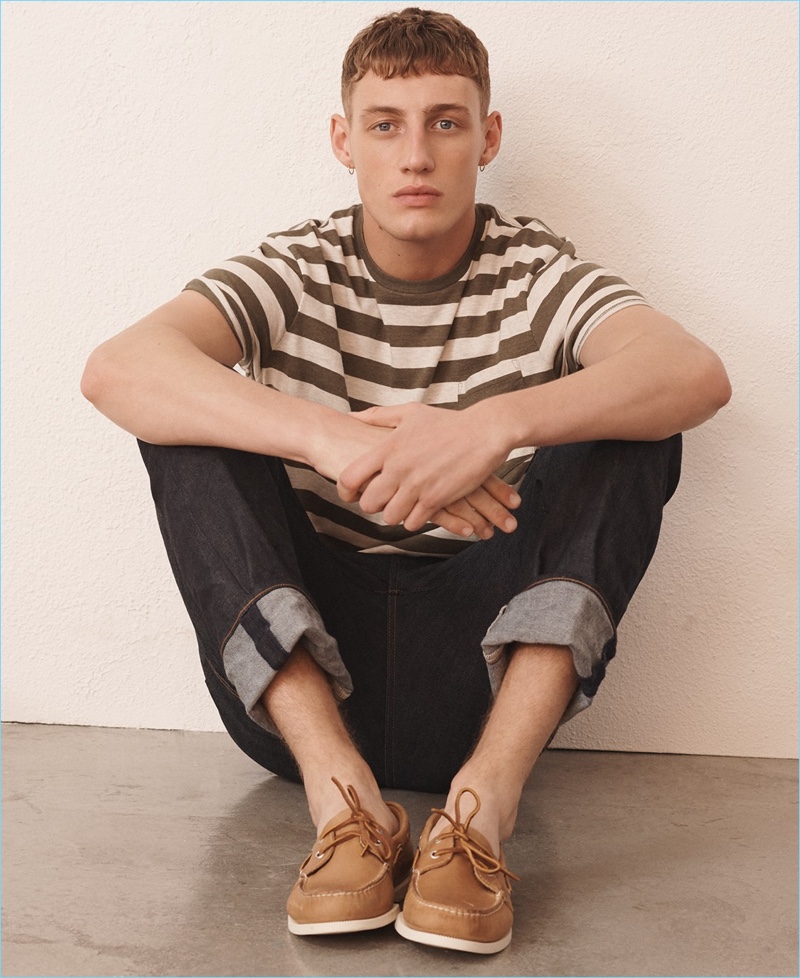 Soft Striped Tees: Aubrey O'Mahony models a J.Crew broken-in striped t-shirt, 770 straight-fit jeans in Japanese denim, and Sperry boat shoes.