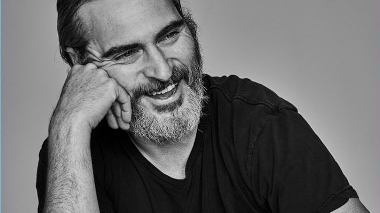 Actor Joaquin Phoenix sits for a black and white portrait.