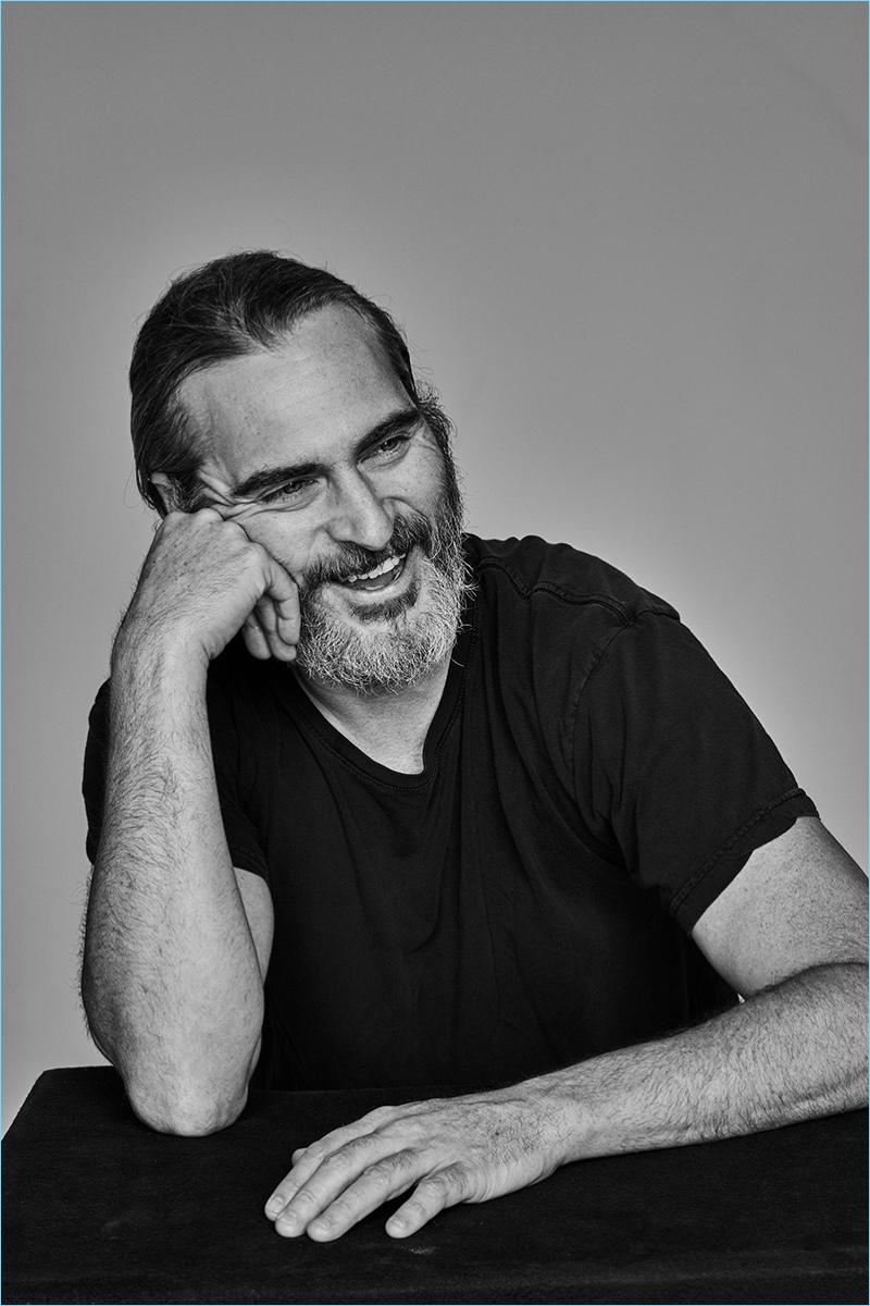 Actor Joaquin Phoenix sits for a black and white portrait.