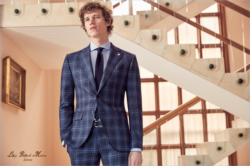 Model Marçal Taberner is front and center in a blue suit from Luigi Bianchi Mantova's fall-winter 2018 collection.