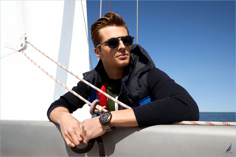 British model Edward Wilding dons sunglasses and a watch for Nautica's fall-winter 2018 campaign.