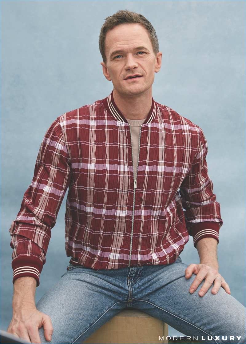 Front and center, Neil Patrick Harris wears a Hermès bomber jacket, Levi's jeans.