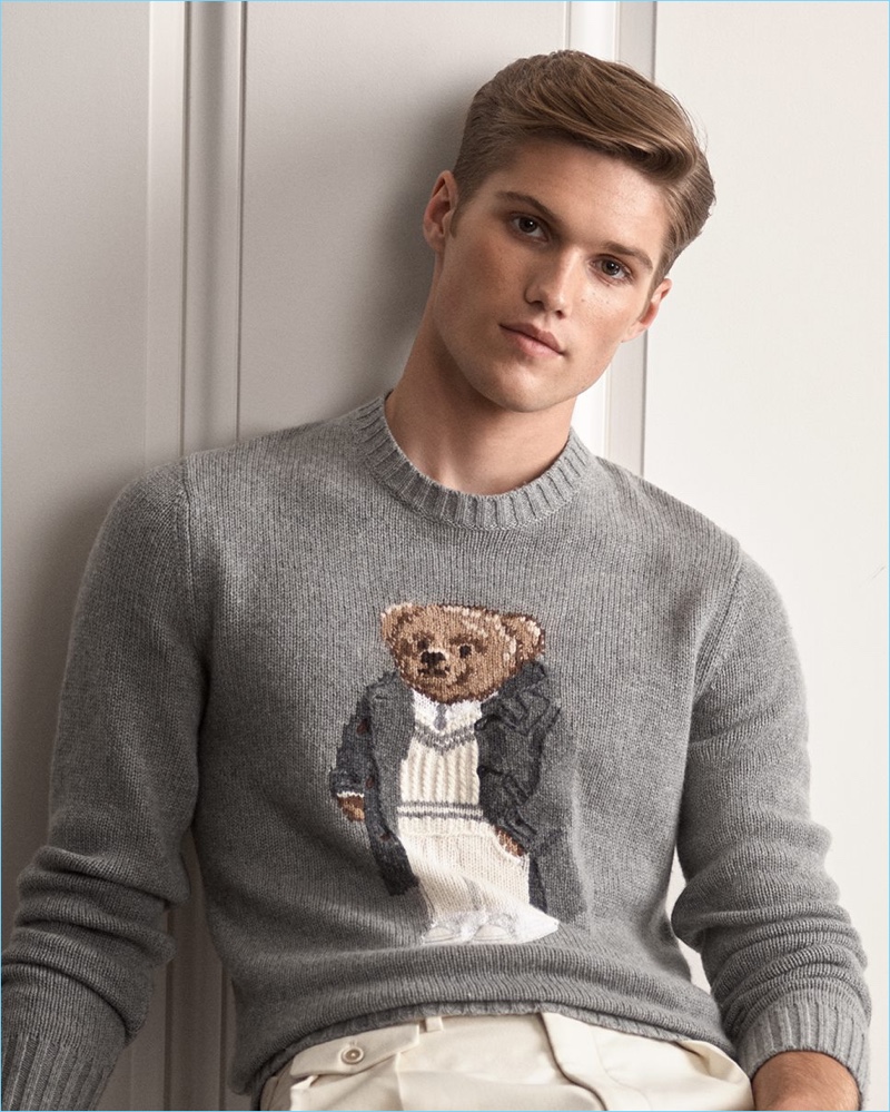 Front and center, Nick Truelove sports Ralph Lauren Purple Label's iconic Polo Bear sweater.