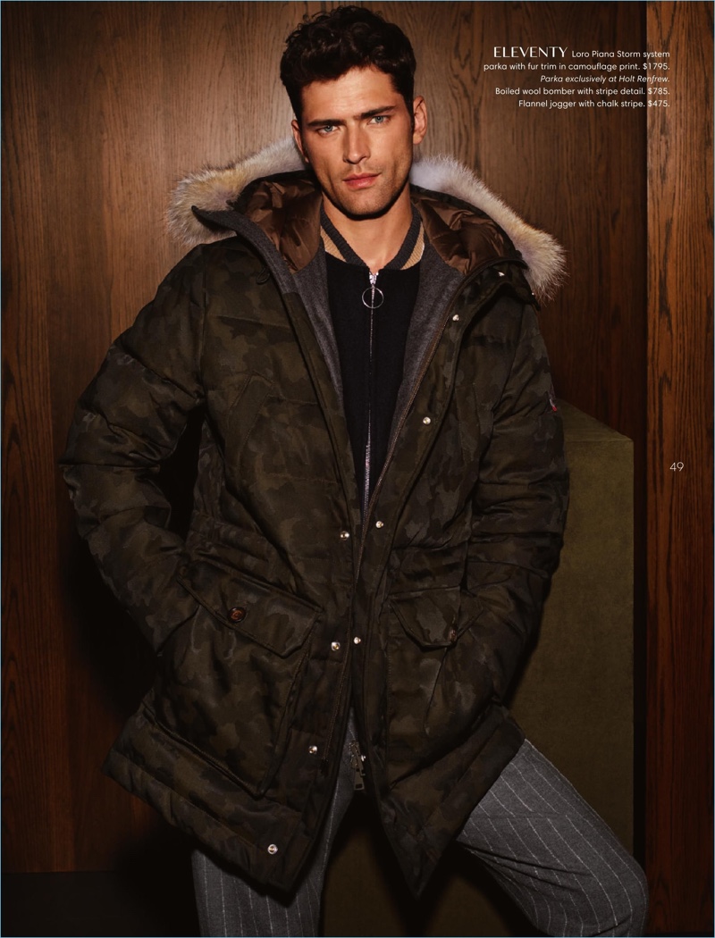 Embracing a camouflage print, Sean O'Pry wears an Eleventy parka.